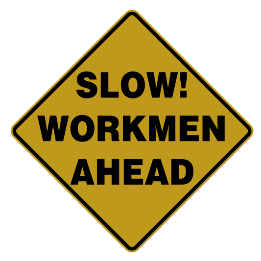 Slow! Workmen Ahead Sign